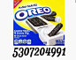 a package of oreo cookies sitting on top of a white box with black lettering