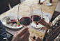 Couple toasting with wine in cafe by Gable Denims on 500px