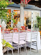 pretty outdoor table with fruit and ginger jars