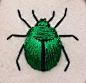 Stumpwork beetle (green june bug - Cotinus nitida) inspired by the work of Jane Nicholas and Di van Niekerk.