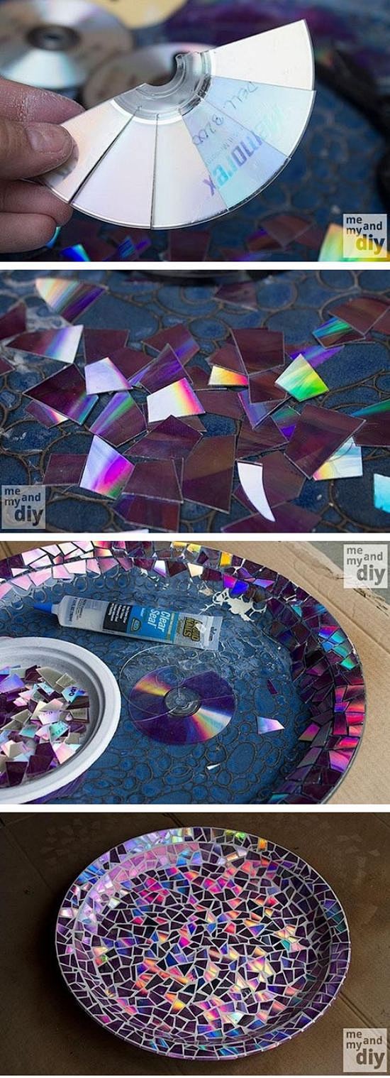 用CD碎片制作的彩色玻璃效果装饰盆。