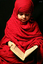 Beautiful picture of a child reading.