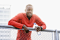 African American runner leaning over railing - stock photo