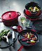 Staub’s industrial-chic enameled cast iron cookware comes in red, dark blue and grey.: 
