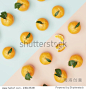 Creative Concept  ,Oranges and orange petals on pastel background, top view.