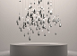 Raincloud - Lighting Installation - Heathfield & Co : Lit from above, the silvered glass drops in this lighting installation design appear to run down a thread catching the light in their mirror-like finish.