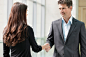 Royalty-free Image: Business executives shaking hands in an office