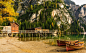 General 1920x1175 boat dock lake mountain beach forest cliff Alps trees Italy nature landscape