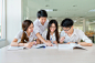 Group of asian students in uniform studying together at classroo : Group of asian students in uniform studying together at classroom