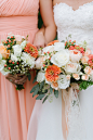 Peach Summer Wedding at The Oaks : This perfectly peach soiree from Natalie Franke is Southern charm to a T, with a fresh nautical vibe mixed in. The bridesmaids donning Donna Morgan pop beautifully against the stunning Bride, while whole peaches stuck wi