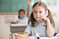 Students working at desks in classroom by Gable Denims on 500px