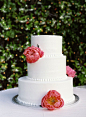 Sleek, Simple Wedding Cake with Peony Decor - On http://www.StyleMePretty.com/california-weddings/2014/03/28/manhattan-beach-wedding-at-the-shade-hotel/  Susan Dean Photography - susandeanblog.com