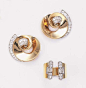 A PAIR OF DIAMOND-SET EARRINGS AND A RING  The ring with two single and baguette-cut diamond columns to the slightly expanding broad hoop; the earrings of scroll design with circular-cut diamond line surmount and pavé-set centre, circa 1935 Ring signed Ca