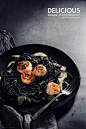 Squid ink spaghetti with scallops and fennel