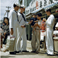 Nat Geo Image Collection 在 Instagram 上发布：“Do you know what year this image of #sailors shopping while on shore leave in #Okinawa was published in National Geographic magazine? The…”