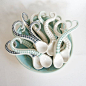 "These tentacle spoons are hand crafted one at a time. They are made from porcelain & come with either white, Bermuda blue, or black dots with a white opal glaze on top. They are the perfect size for espresso cups, caviar or spices. This listing 