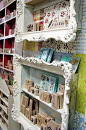 framed shelves for displaying small items like pincushions