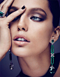 Model Emily DiDonato poses in Fabio Salini earrings with Mikimoto ring and Roland Mouret top