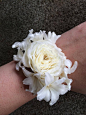 modern elegant all white wrist corsage flower cuff peterkort spray roses white hyacinth blossoms http://sophisticatedfloral.com/