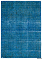 This over-dyed Persian vintage rug is a celebration of both past and present. Created using a technique employed to breathe new life into older hand-knotted rugs, the colors are first neutralized before the rug is over-dyed with its entirely new hue. The 