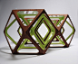 丹麦设计师Rasmus Fenhann设计的多面框架几何体茶几—Kubo，不但让茶几有了更为夸张而优美的外形，同时玻璃与木框架的结合更显得通透，成了一件富有创意和吸引力的家具作品