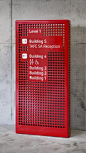 perforated totem with directional signage