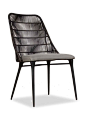 The Agustin Side Chair is cast aluminum with faux woven wicker and an upholstered seat.