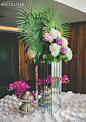 WedLuxe: large floral arrangement with tropical flowers