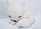 Sleepy white fox amigurumi