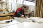 Carpenter using table saw in workshop by Gable Denims on 500px