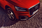 Audi Q2 coral orange : Audi Q2 with coral orange paintjob offroad and urban