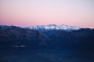 mountain range snow sky