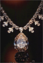 Victoria-Transvaal Diamond Necklace: a 67.89 carat, pear-shaped, champagne-colored diamond. Cut from a 240-carat crystal, it is suspended from a chain of 108 diamonds that total about 45 carats.