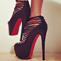 Black Christian Louboutin Stiletto high heels. I feel like caged sandals were so 2010...but I still like these