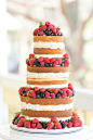 Naked Cake -- We know, we know... naked wedding cakes aren't everyone's favorite. But when the berries are so plump and the layers of frosting are as wide as the layers of cake -- this one might just change your mind ;)  Cake by TheSugarSuite.com | Amalie