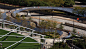 千禧公园——BP人行天桥 : At 935 feet in length, the sinuous BP Pedestrian Bridge is a prominent feature in downtown Chicago. Snaking across Columbus Drive, a main thoroughfare, the footbridge is one of several notable collaborations between SOM and Frank Gehry. In 