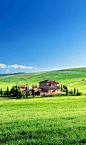 Tuscany landscape with typical farm house, Italy
