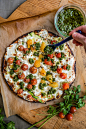How to Make Socca, a Naturally Grain-Free + Gluten-Free Flatbread - Hello Veggie : Socca is a thick savory pancake or flatbread made with chickpea flour, so it's naturally grain-free and gluten-free. We love using it as a base for a pizza!