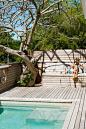 Pool with white interior and decking around perimeter