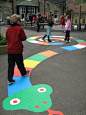 ground mural and game, this would be fun in the drive way with sidewalk chalk paint: 