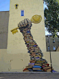 Education is the Key to Knowledge. Created by street artist Marcin “Barys” Barjasz, in Lódź, Poland. Photo by Regina Lang.