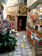 Walk the ancient little streets and wander. Find a treasure of a bookshop like this one in Venice, Italy