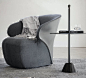 Contemporary armchair / cowhide  / leather / fabric AROM Zanotta