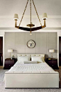 Master Bedroom.  Ivory with dark wood.