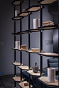 Shelving by Pietro Russo for Baxter ; woven wicker shelves and brass details.