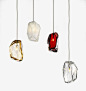 Cut glass pendant lamps called TCrystal Rock lights, designed by Arik Levy for Lasvit