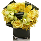 yellow roses, yellow pincushions and green cymbidiums Corporate flowers, corporate flower centerpiece, add pic source on comment and we will update it. www.myfloweraffair.com can create this beautiful flower look.: 
