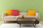 现代室内与米色沙发和绿墙前的表