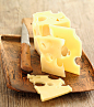 法国人唤为“fromage”，德国人称为“kaese"，意大利人称为“formaggio”。英语中cheesecake常用来形容清凉的海报女郎（pin-up girls）。
奶酪（其中的一类也叫干酪）是种发酵的牛奶制品，其性质与常见的酸牛奶有相似之处，都是通过发酵过程来制作，也都含有可以保健的乳酸菌，但奶酪浓度比酸奶更高，近似固体食物，营养价值也因此更加丰富。每公斤奶酪制品都是由10公斤的牛奶浓缩而成，含有丰富的蛋白质、钙、脂肪、磷和维生素等营养成分，是纯天然食品。