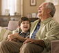 Photograph Caucasian boy laughing with grandfather by Gable Denims on 500px